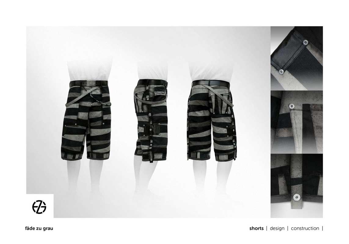 fashion model presents black and gray shorts